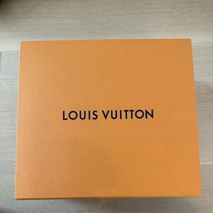 Louis Vuitton box and ribbon
